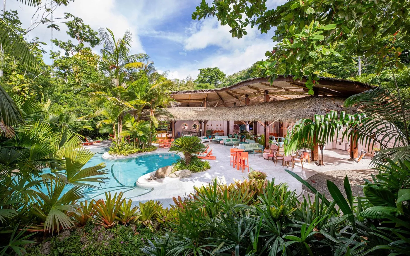 The pool, thatched pavilion and terrace of Hotel Aguas Claras on Playa Chiquita
