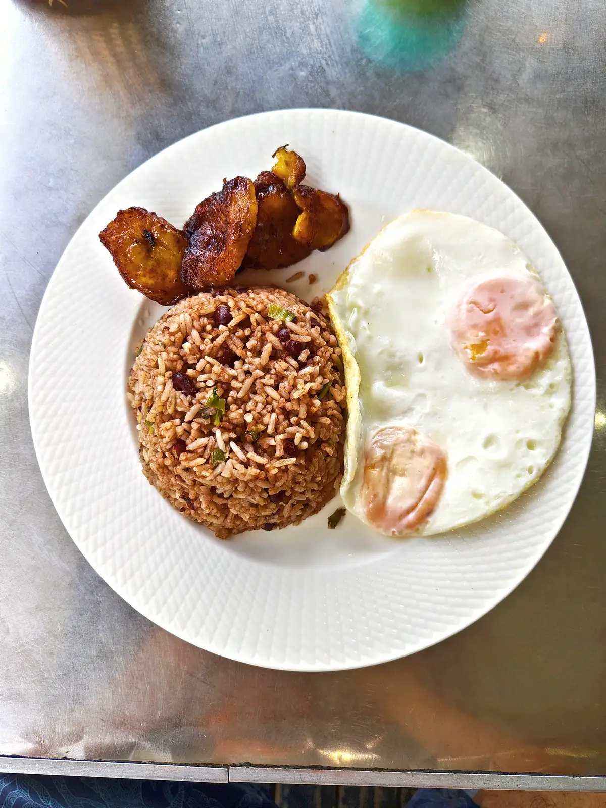 Gallo pinto with a fried egg and plantain in Puerto Viejo