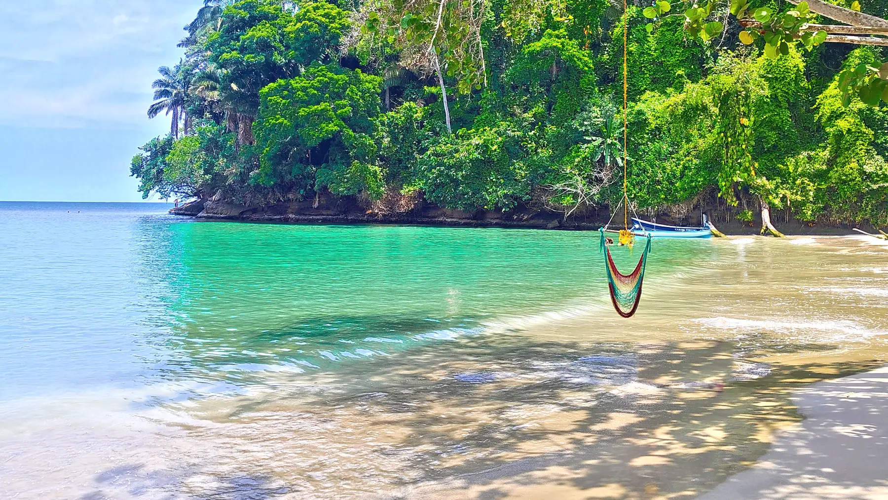 The turquoise cove at Punta Uva, with forest down to the sand